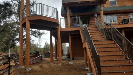 Custom deck wrap around deck with 10” log posts from Colorado Springs Deck Builder